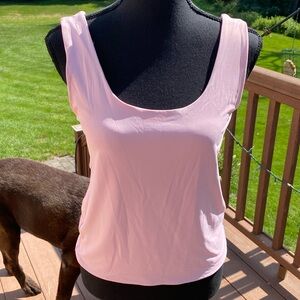 Petal pink sleeveless stretchy tank top. Size L.